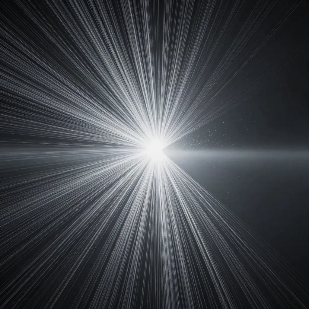Silver filaments converging into a soft white bloom in a dark graphite void